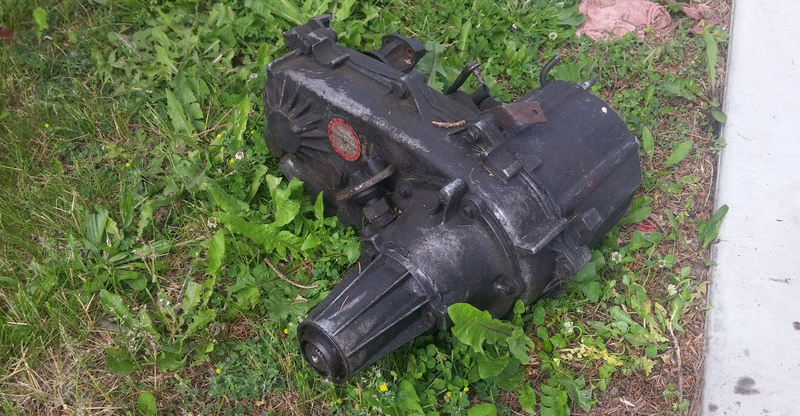Lifting a heavy component like this transfer case by yourself could be rough.